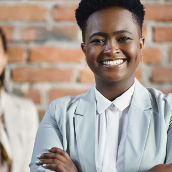 Business Team Smiling facing front in suit