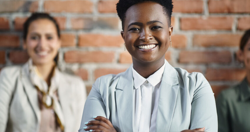 Business Team Smiling facing front in suit